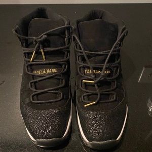 Black and gold Jordan 11